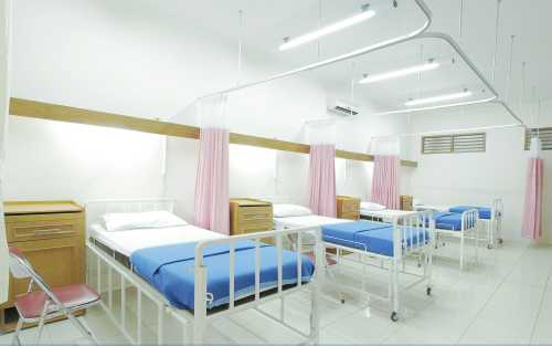 The Reimbursement Pincer: How Site-Neutral Cuts and the Subsidy Cliff are Restructuring American Healthcare